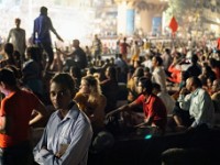 DSC01009  Boats with thousands of people gathering in front of the Dashashwamedh Ghat to attend the night prayer.