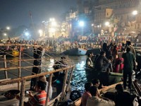 DSC01014  Boats with thousands of people gathering in front of the Dashashwamedh Ghat to attend the night prayer.