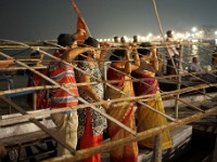 DSC01045  People observing the night prayer at Dashashwamedh Ghat.