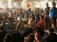 DSC01057  Boats with thousands of people gathering in front of the Dashashwamedh Ghat to attend the night prayer.