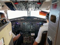 DSC01642  Entering the cockpit on scenic Everest flight.