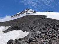 Volcan Lanin ( Day 1 )  The summit looks a lot closer from here, but it's still 1200m in altidute to go...